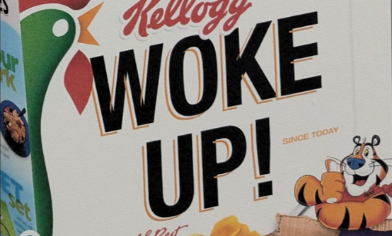 A poster parodying a Kellogg Cornflakes packet. Text reads "Kellogg Woke Up!"