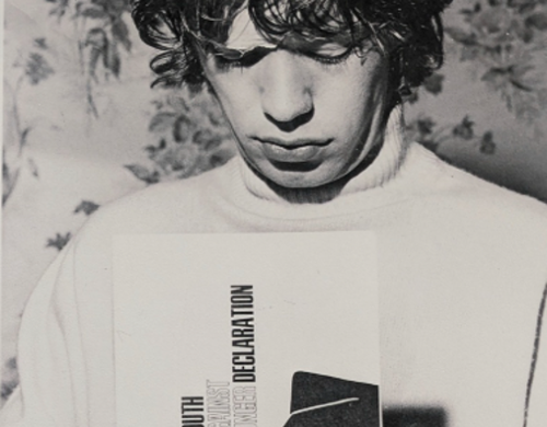 Mick Jagger signing Oxfam's Youth Against Hunger declaration.