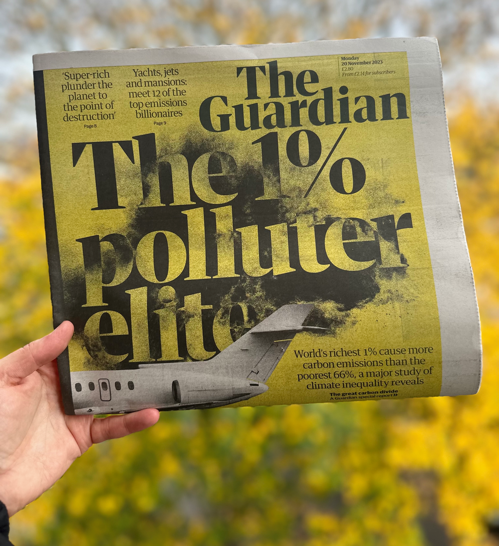 A Guardian newspaper with 'the 1% polluter elite' as a headline an a graphic of a plane.