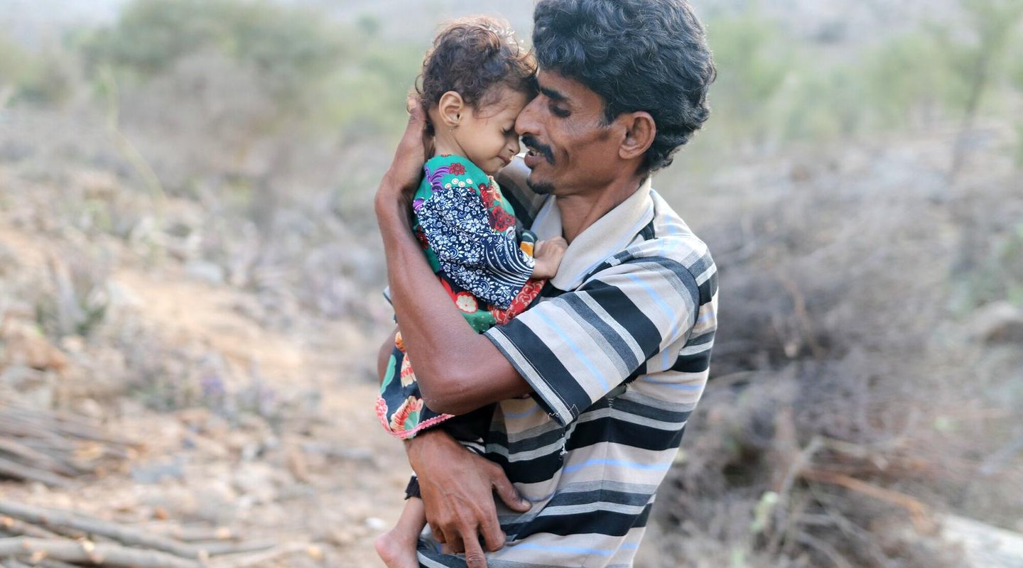 Ali and his daughter in Yemen. Photo: Kaff Media/Oxfam
