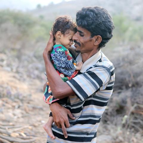 Ali and his daughter in Yemen. Photo: Kaff Media/Oxfam