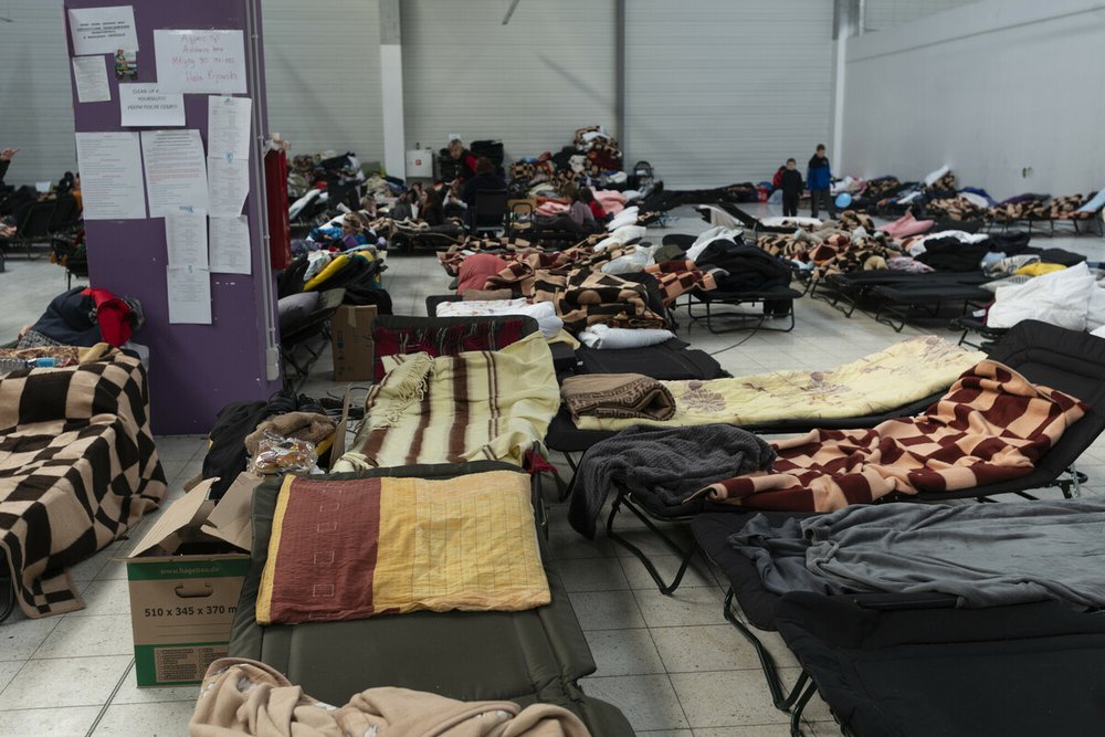 Beds at the Halla Kijowska reception center for refugees