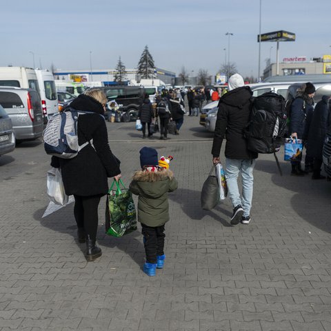 Xenia, Armel and their son Gabriel* 3 at a transit centre in Poland