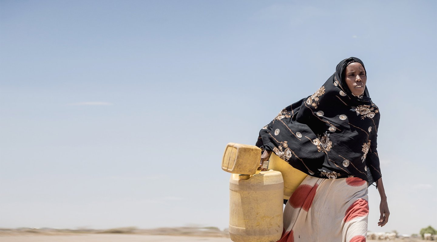 Seinab headed to the dam to fetch water in Isiolo County, Kenya.