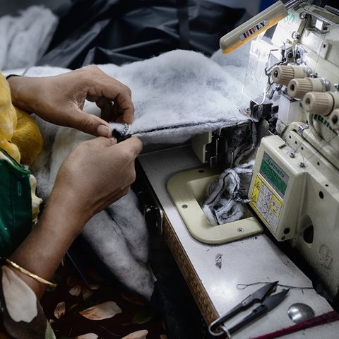 Textile workers are working inside a garment factory in Savar. Bangladesh