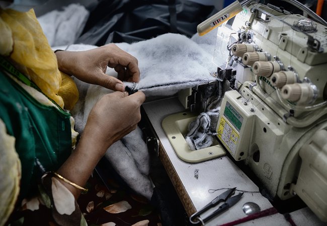 Textile workers are working inside a garment factory in Savar. Bangladesh