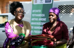 Ligineti Nayinayi (right) is a Cyclone Freddy survivor and has been supported by Oxfam with emergency cash. Photo: Thoko Chikondi / Oxfam