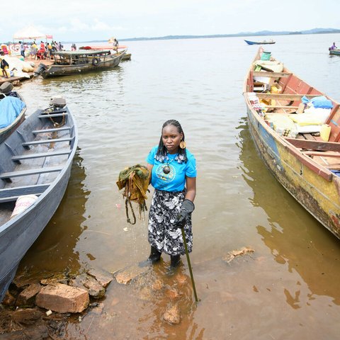 Ugandan climate activist Hilda taking part in a clean up sessions in Lake Victoria.