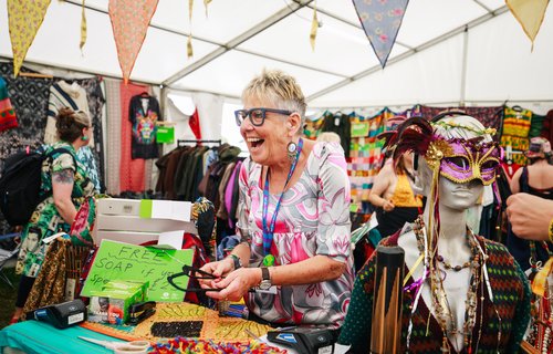 Melanie working on the till as our WOMAD Festival shop