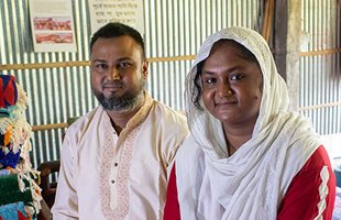 Zakir and Nujhat (Business owners of Talha rug company) sitting in their home based rug factory in Rangpur, Bangladesh.