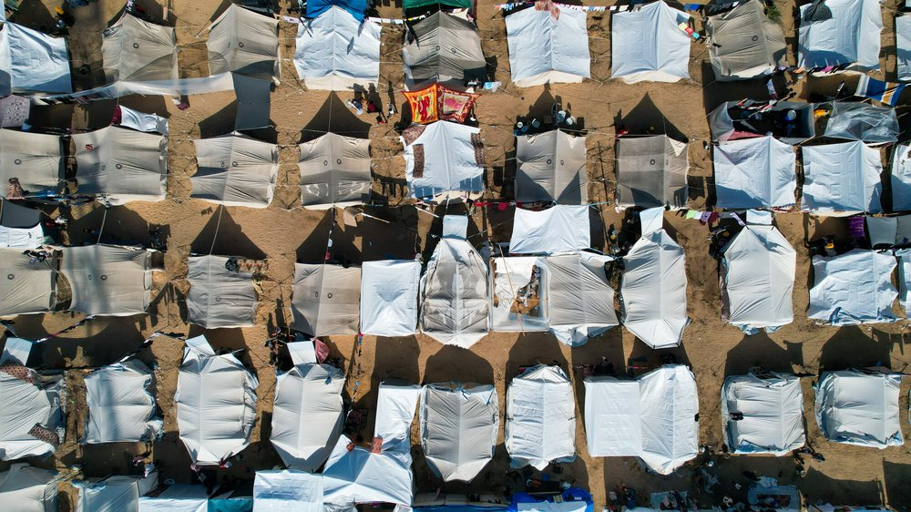 An aerial view of white tens for displaced people in Gaza.