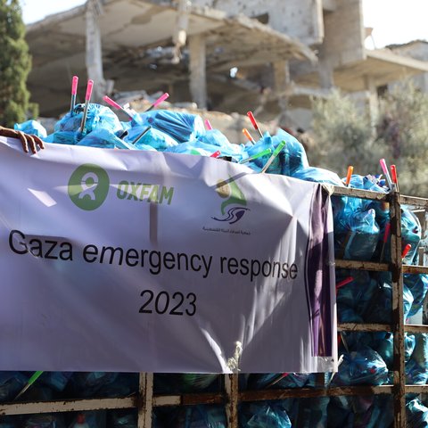 A truck with hygiene kits on the back in the streets of the bombed Gaza Strip