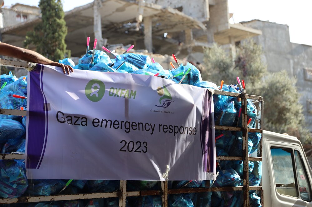 A truck with hygiene kits on the back in the streets of the bombed Gaza Strip