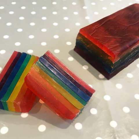 A close-up of rainbow-coloured homemade soap