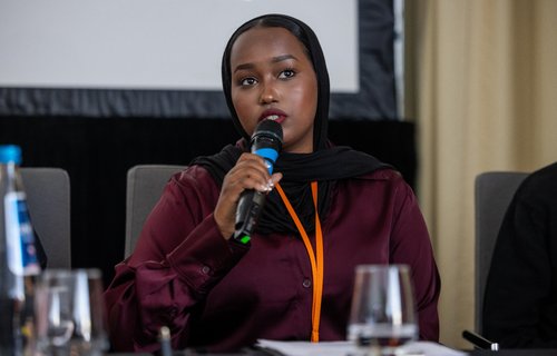 Sainab speaking at the Warsaw Human Dimension Conference