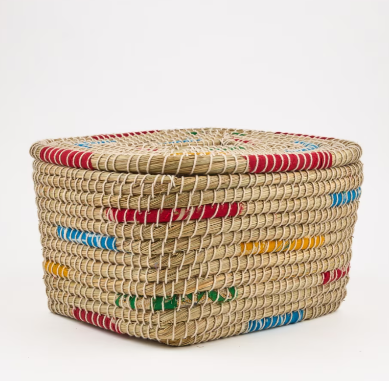A woven basket interspersed with colourful sections of recycled saris.