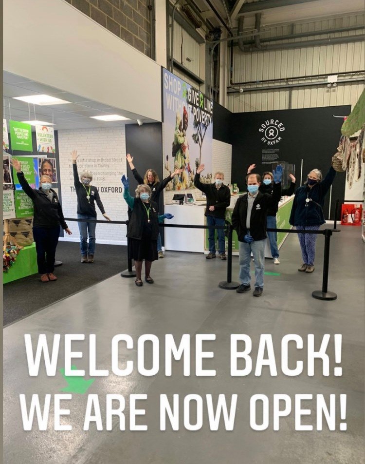 Staff and volunteers wearing masks wave and text on the image says 'welcome back!'