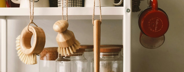 A kitchen shelve showing with eco-friendly kitchen appliances made from wood.