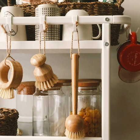 A kitchen shelve showing with eco-friendly kitchen appliances made from wood.