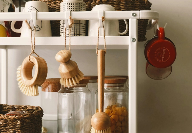 A kitchen shelve showing with eco-friendly kitchen appliances made from wood.