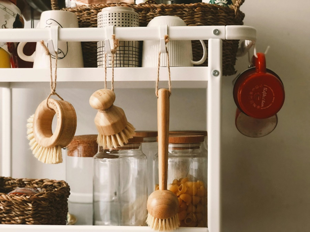 A kitchen shelve showing with eco-friendly kitchen appliances made from wood.