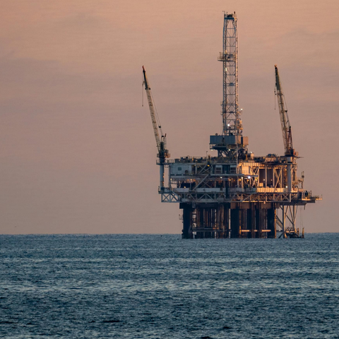 Image of oil rig with text reading they're making billions