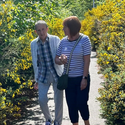 Diane McKechnie and her husband Ali taking a walk.