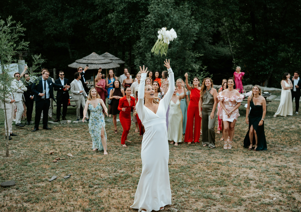 Bride throwing the bouquet