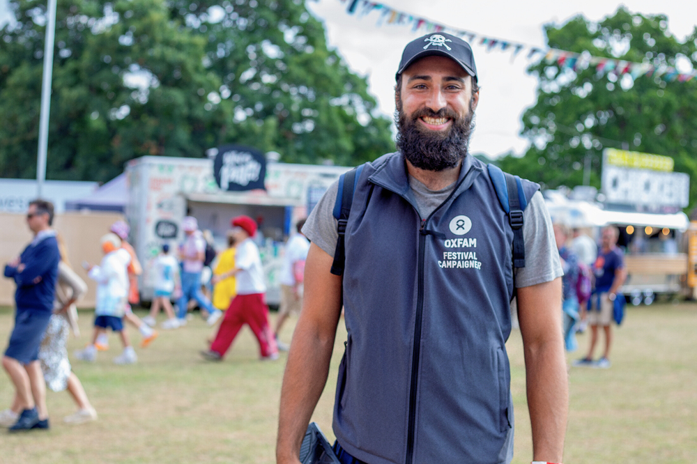 Oxfam festival campaigner smiling at the camera