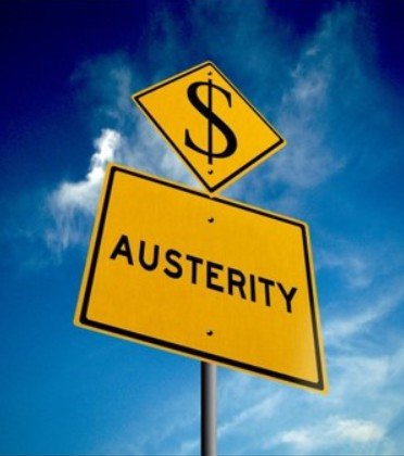 A yellow signpost with the word Austerity printed in black below another signpost of a dollar sign.