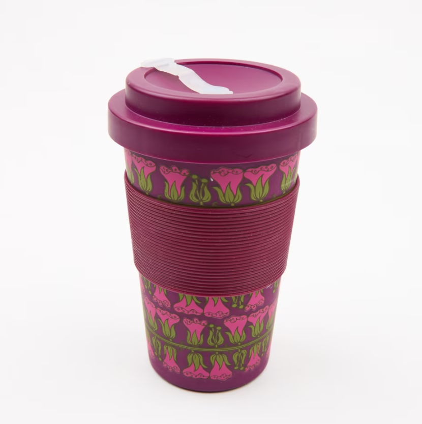 Close up of a purple travel cup decorated with a Belinda Lyon-inspired pattern