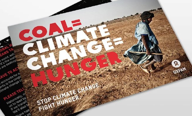 Leaflets reading 'Coal = climate change = hunger' over an image of a farmer walking across a barren landscape.