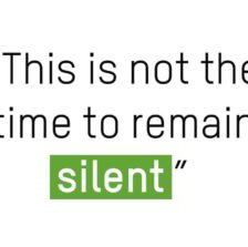 The words 'now is not the time to remain silent' on a white background