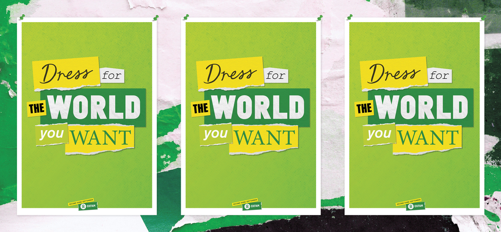 Green posters pinned to a torn background with map pins that say 'dress for the world you want' on them.