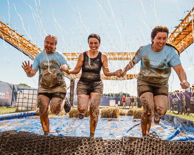 team taking part in Tough Mudder UK