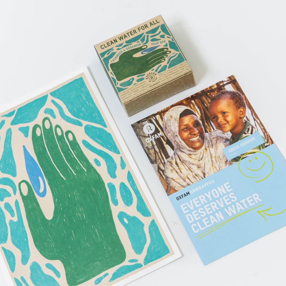 Oxfam Unwrapped clean water gift with illustrated artwork, soap packaging and a donation card.