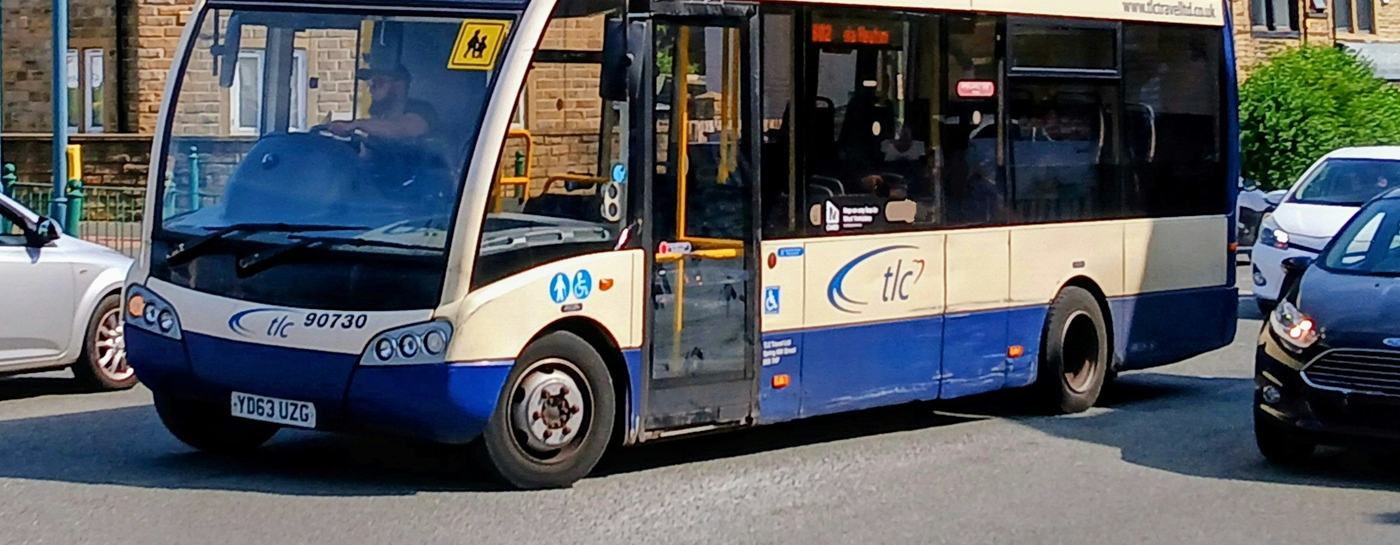 Photo of a single decker bus going to Shipley driving along an English road