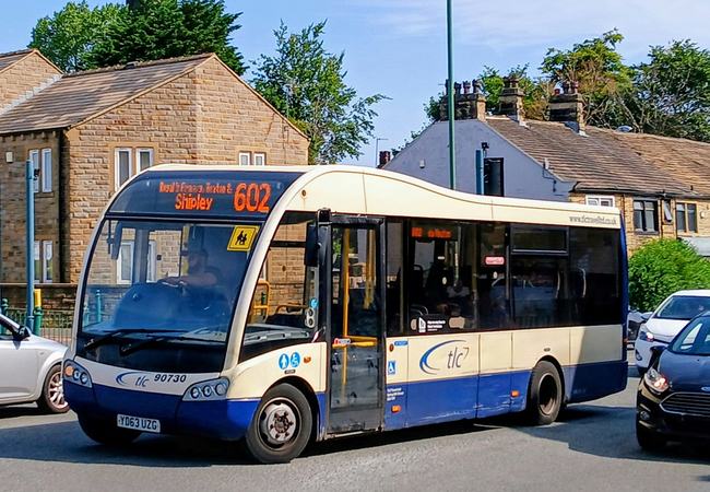 Photo of a single decker bus going to Shipley driving along an English road