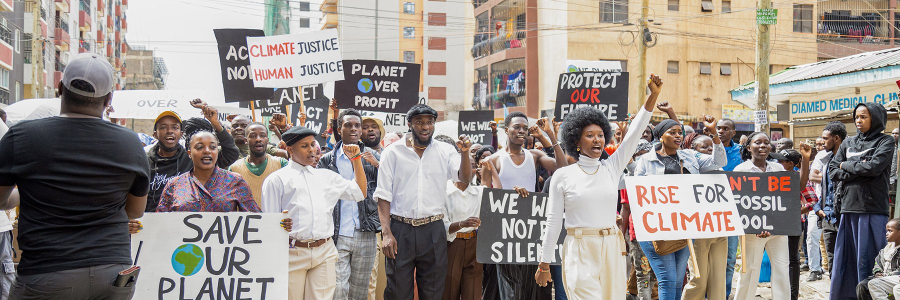 Kenyan activist Joyce leading a climate crisis protest march.