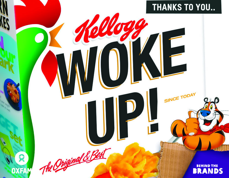 A kellogs cornflakes cereal box with 'woke up!' written on it