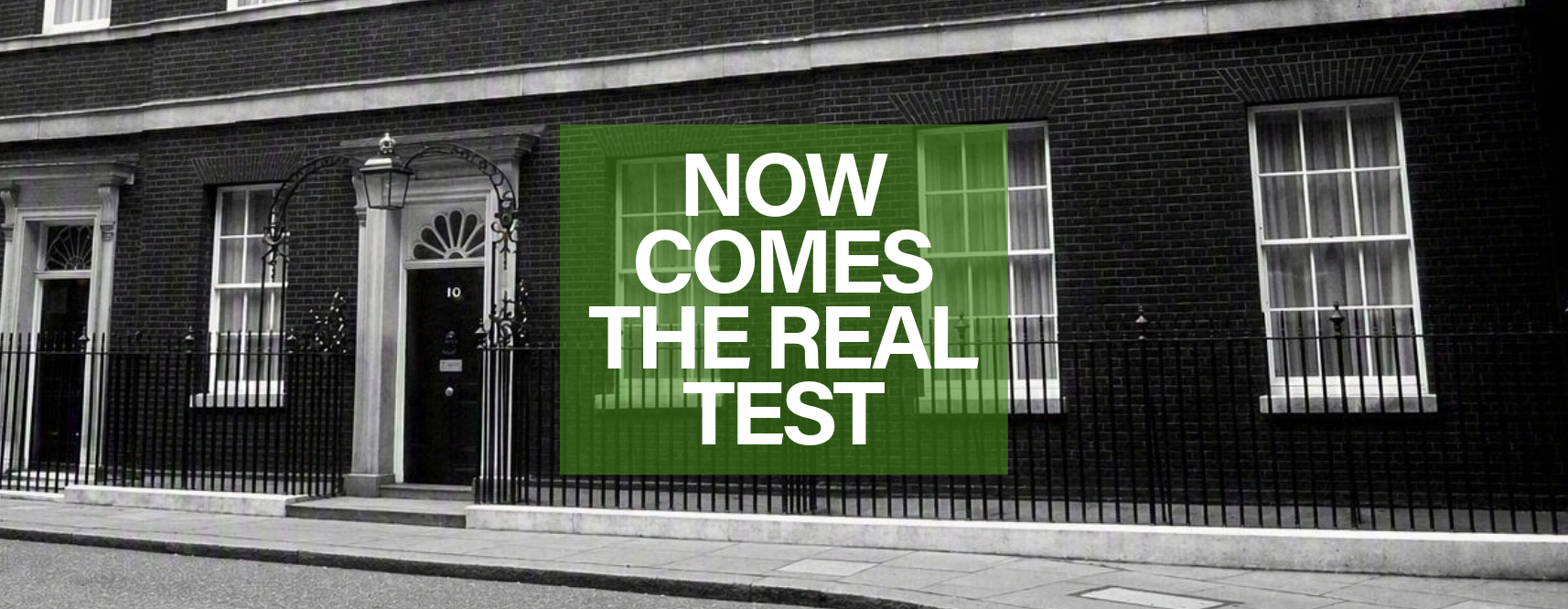 Downing street with a text overlay of 'Now comes the real test'