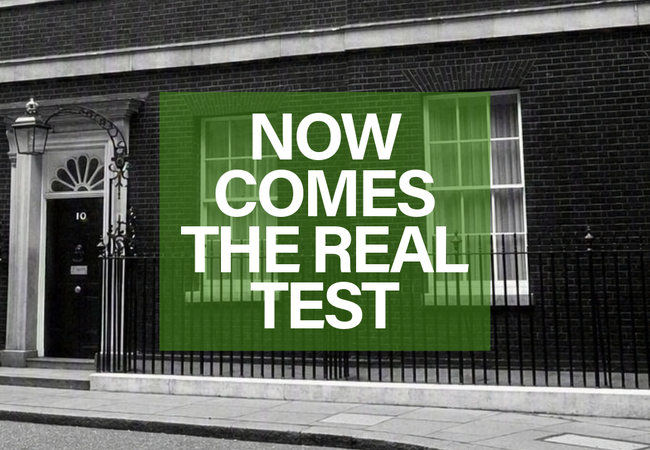 Downing street with a text overlay of 'Now comes the real test'