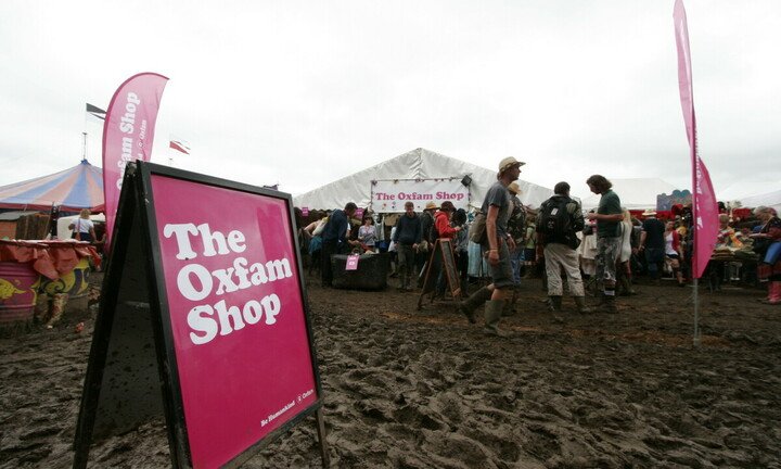 Festival goers visit the Oxfam shop during the 2011 Glastonbury festival. Photo: Oxfam