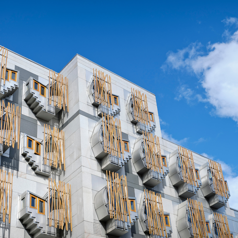 Scottish Parliament building with blue sky