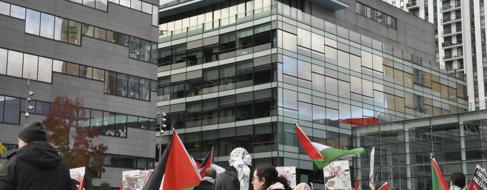 Salford, Greater Manchester, UK. 10.21.2023: Pro Palestinian protesters gather en masse outside BBC offices in Media City, Salford, in protest of broadcaster's coverage of Israel Palestine conflict.