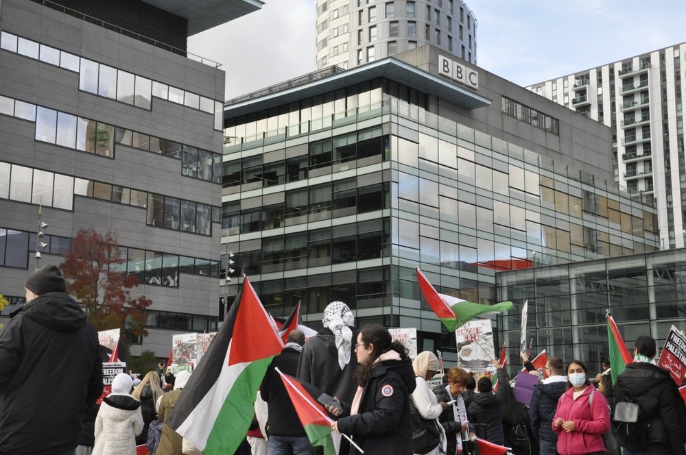 Salford, Greater Manchester, UK. 10.21.2023: Pro Palestinian protesters gather en masse outside BBC offices in Media City, Salford, in protest of broadcaster's coverage of Israel Palestine conflict.