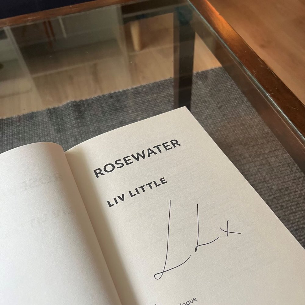 Author Liv Little's signature on the first page of their book rosewater