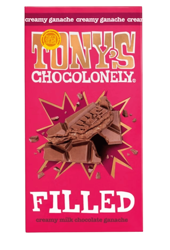 Tony's Chocolonely Filled Creamy Ganache milk chocolate bar packaging in bright pink. The front shows large white and gold "TONY'S CHOCOLONELY" branding, a yellow "Open Chain" badge, and an image of broken milk chocolate pieces with creamy ganache filling