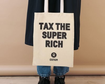 Tote bag with the text Tax the super rich