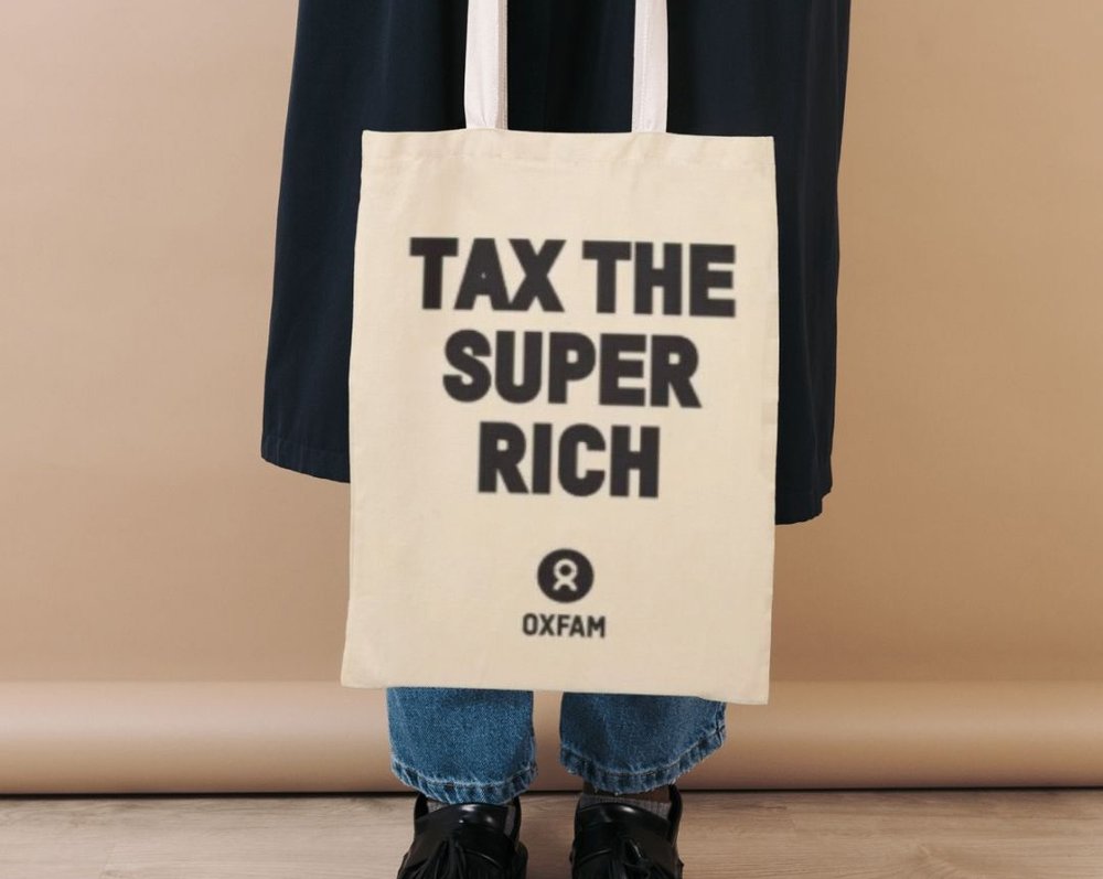 Tote bag with the text Tax the super rich